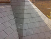 close mitered hip and valley on slate roof in chester